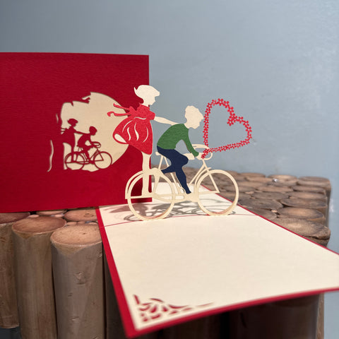Pop up koppel op een fiets - liefde
